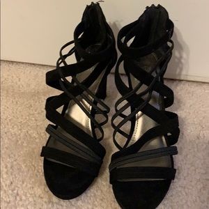 Strapped black high heel